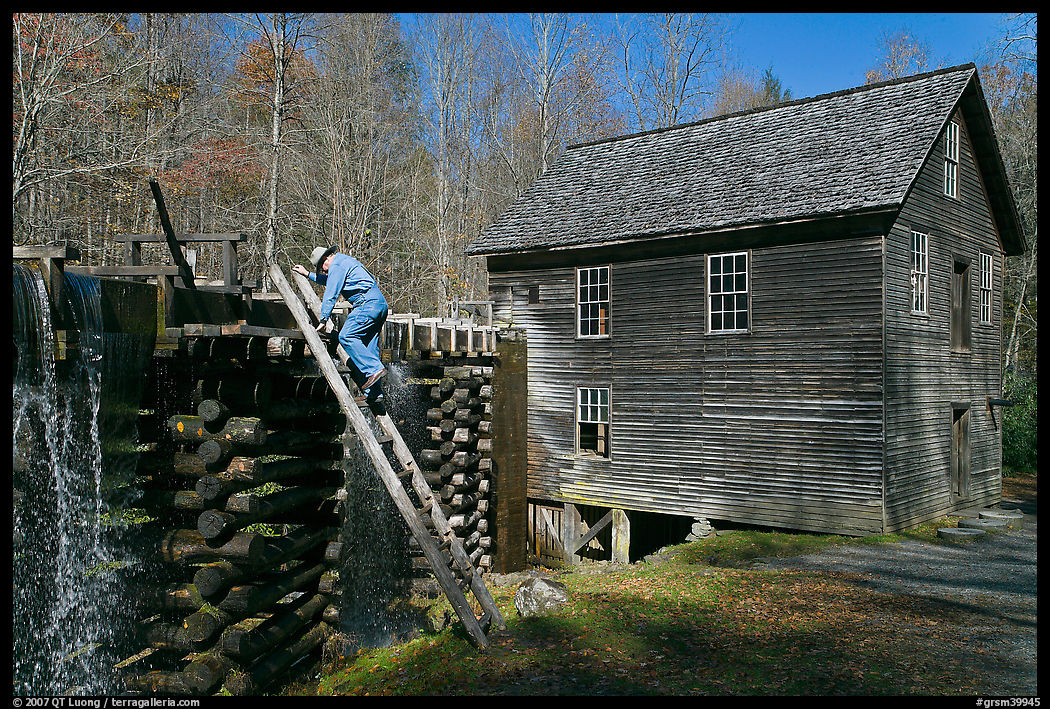 Miller climbing onto millrace, Mingus Mill, North Carolina. Great Smoky Mountains National Park, USA.