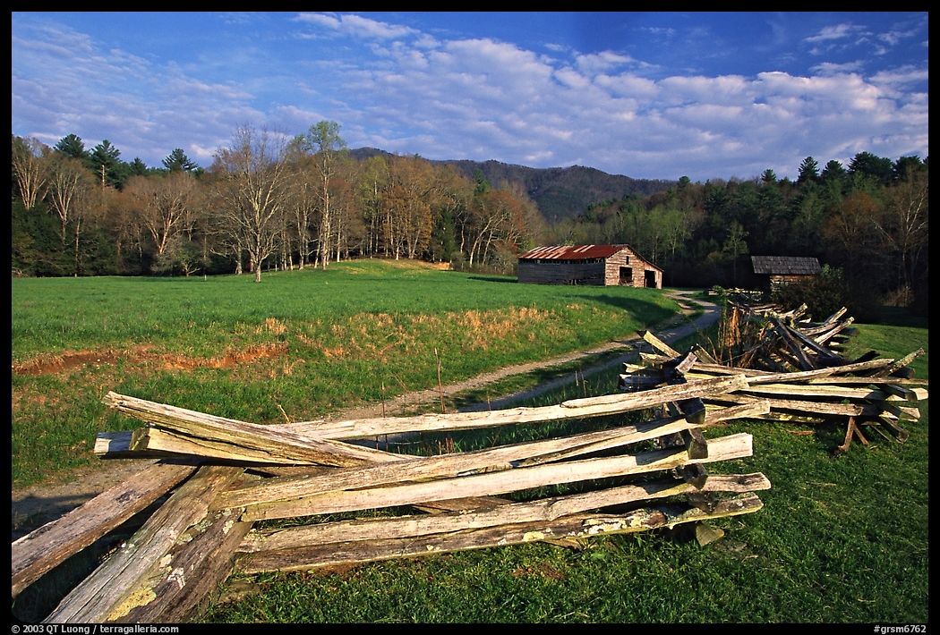 Wooden fence, pasture, and cabin, late afternoon, Cades Cove, Tennessee. Great Smoky Mountains National Park, USA.