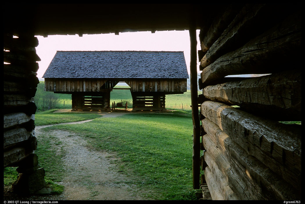 Cantilever barn framed by doorway, Cades Cove, Tennessee. Great Smoky Mountains National Park, USA.