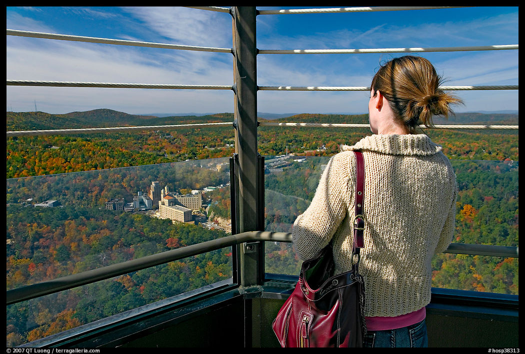 Visitor looking at the view from Hot Springs Mountain Tower in the fall. Hot Springs  National Park, Arkansas, USA.