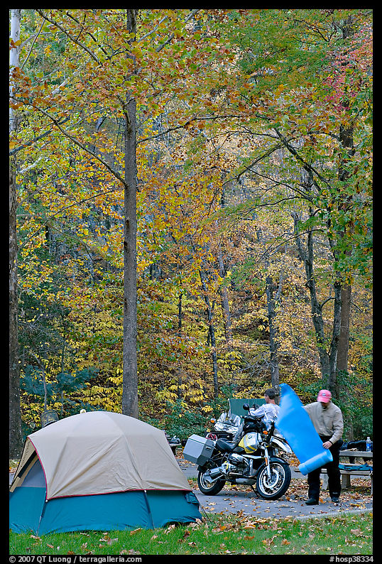 Tent and motorcycle camper under trees in fall colors. Hot Springs  National Park, Arkansas, USA.