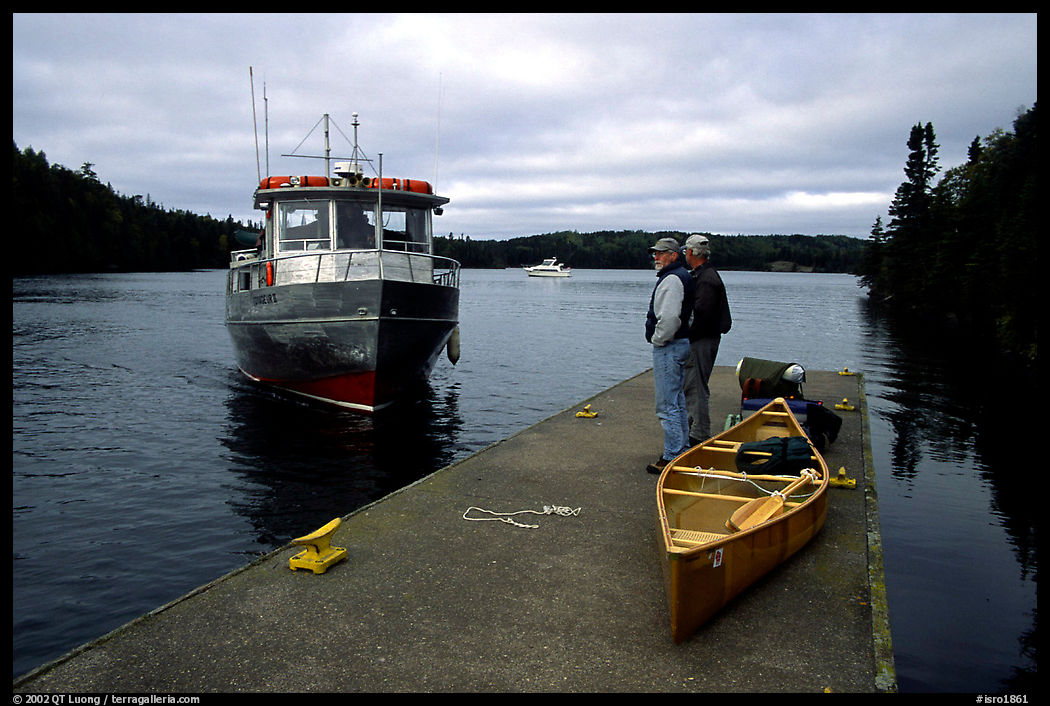 Canoists waiting for pick-up by the ferry at Chippewa harbor. Isle Royale National Park, Michigan, USA.