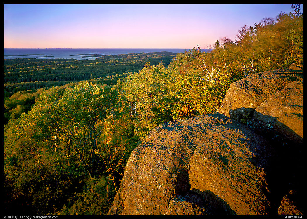 Mount Franklin outcrop, trees, and Lake Superior in the distance. Isle Royale National Park, Michigan, USA.