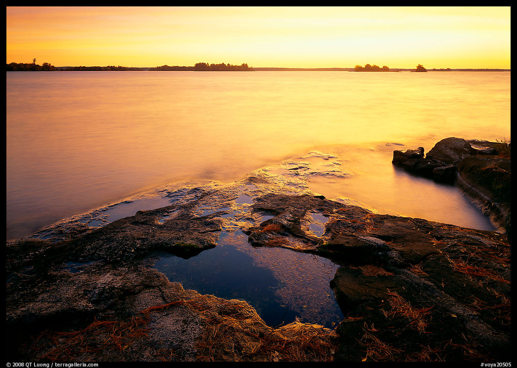 Lake and eroded granite at sunrise. Voyageurs National Park, Minnesota, USA.