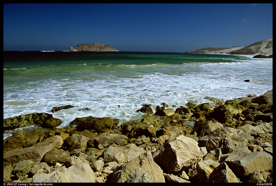 Surf foam and rocks, Cuyler Harbor, mid-day, San Miguel Island. Channel Islands National Park, California, USA.