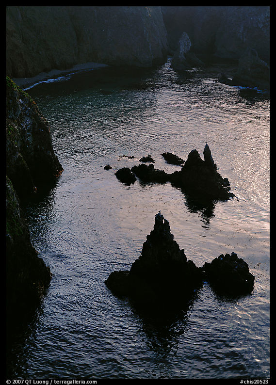 Rocks and ocean, Cathedral Cove, Anacapa, late afternoon. Channel Islands National Park, California, USA.