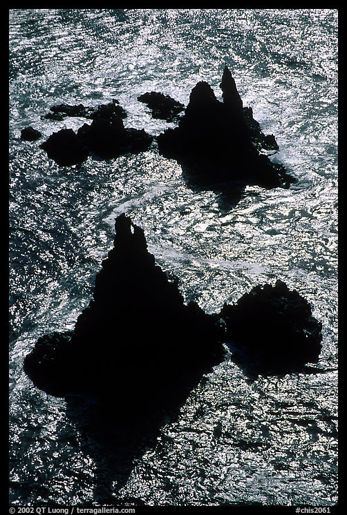 Backlit rocks and water, Cathedral Cove, Anacapa, late afternoon. Channel Islands National Park, California, USA.