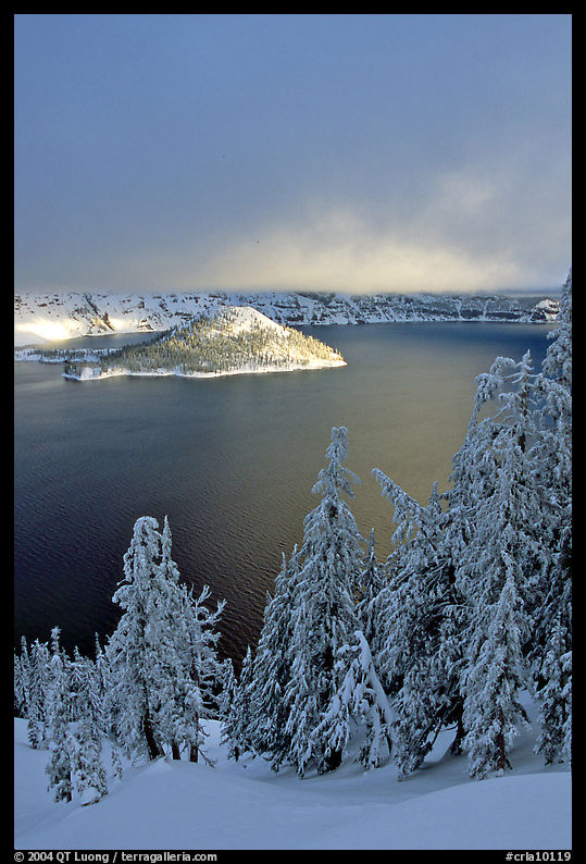 Lake and Wizard Island, winter sunrise. Crater Lake National Park, Oregon, USA.
