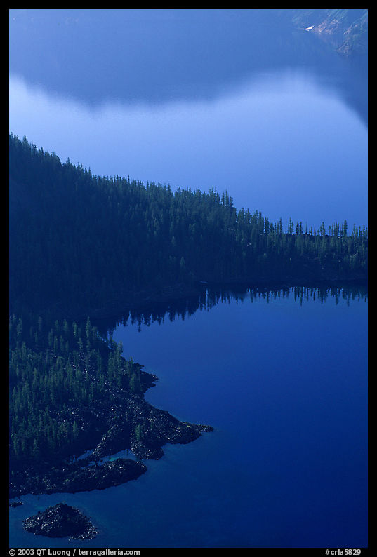 Wizard Island and crater rim reflection, early morning. Crater Lake National Park