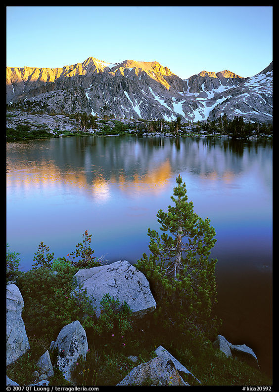 Boulders, tree, and Woods Lake at sunset. Kings Canyon  National Park, California, USA.