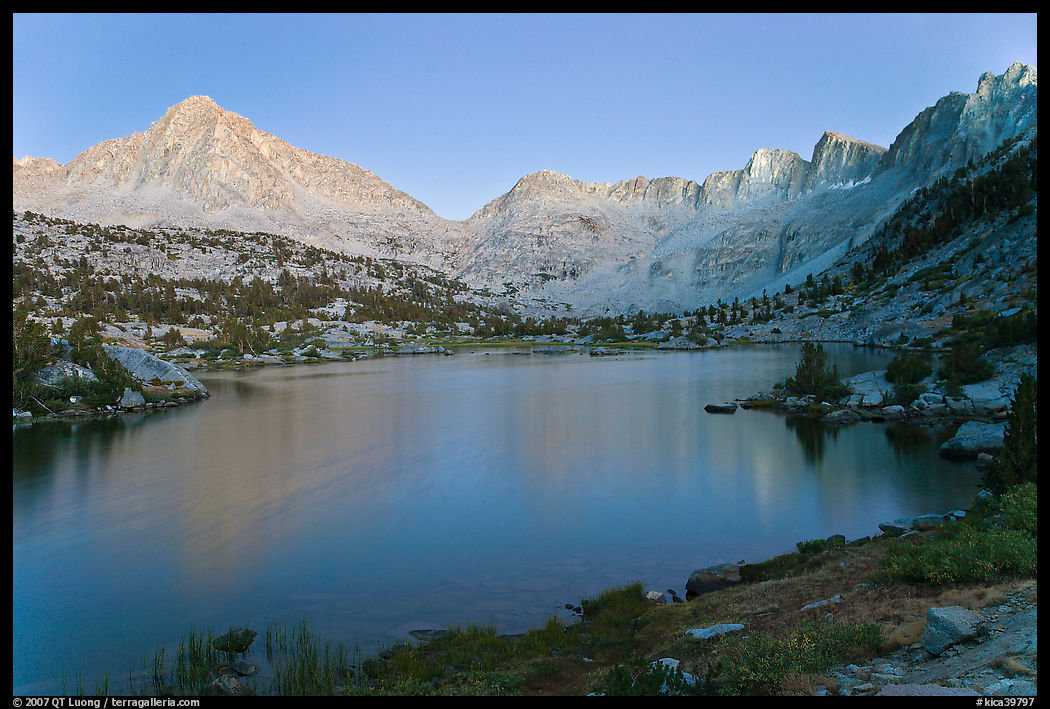 Columbine Peak, Palissades, and Mt Giraud at dusk above lake. Kings Canyon  National Park, California, USA.