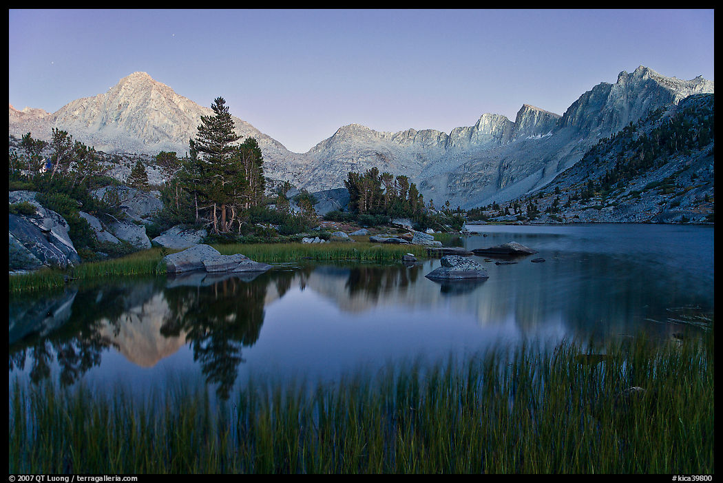 Lake, grasses, and Palissade mountains at dusk. Kings Canyon  National Park, California, USA.