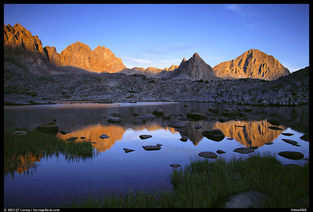 Mt Thunderbolt, Isoceles Peak, and Palissades reflected in a lake in Dusy Basin, sunset. Kings Canyon  National Park, California, USA.