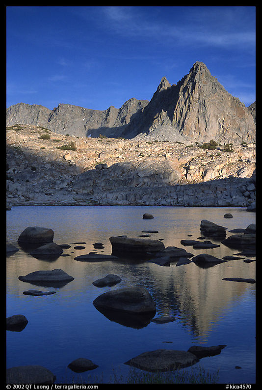 Isoceles Peak reflected in a lake in Dusy Basin, late afternoon. Kings Canyon  National Park, California, USA.