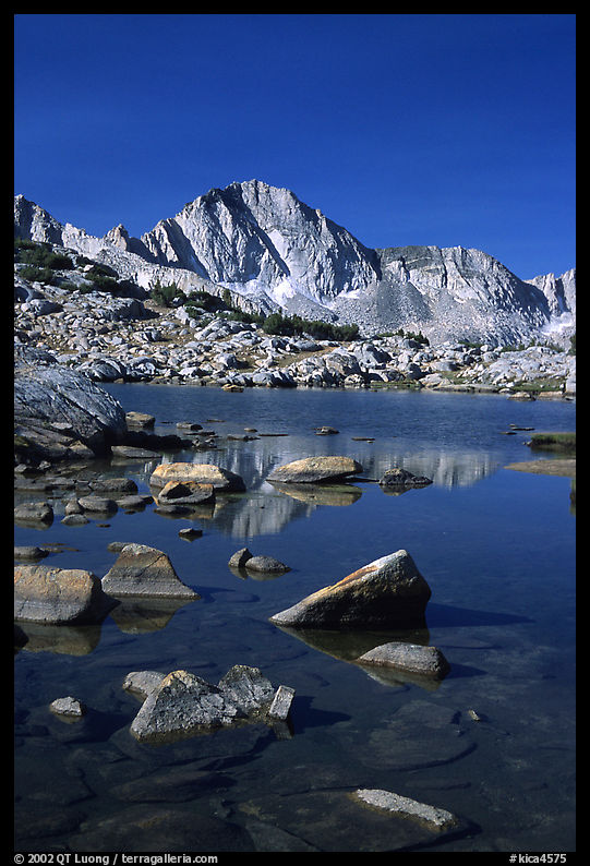 Mt Giraud reflected in a lake in Dusy Basin, morning. Kings Canyon  National Park, California, USA.