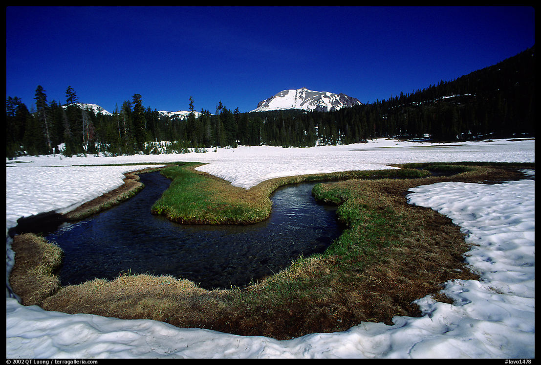 Stream in partly snow-covered Dersch meadows, morning. Lassen Volcanic National Park, California, USA.