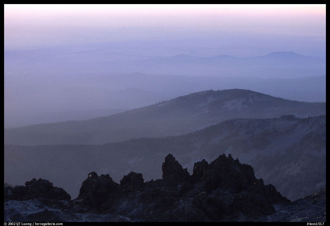 Ridges and volcanic rocks from  summit of Lassen Peak, sunset. Lassen Volcanic National Park