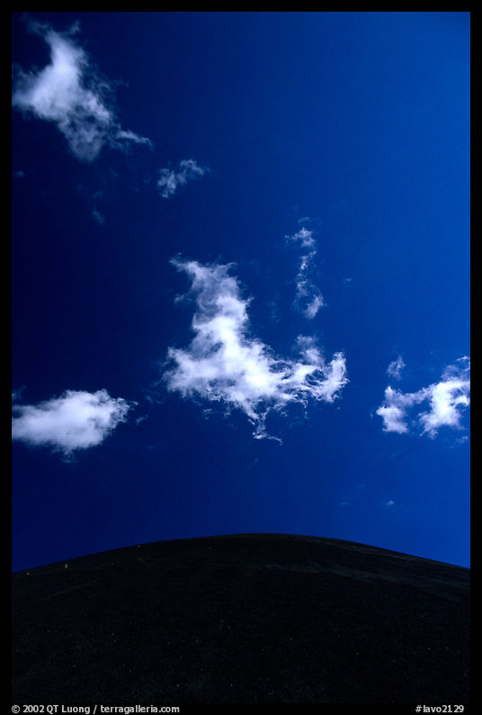 Clouds and round cinder cone. Lassen Volcanic National Park, California, USA.