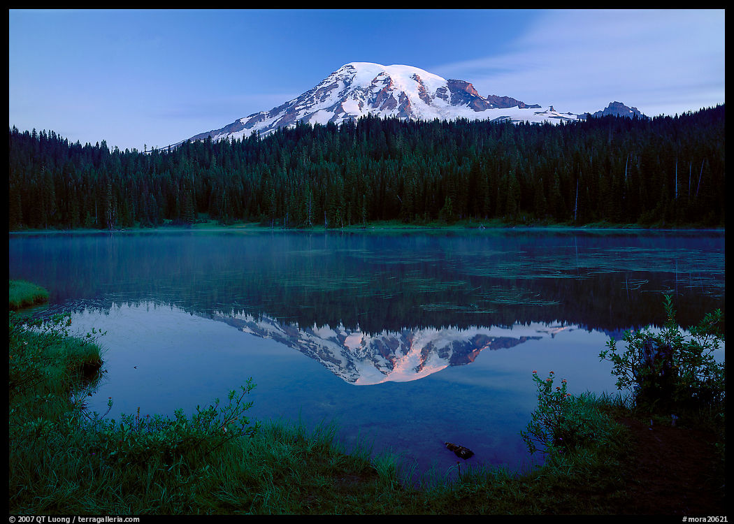 Mount Rainier reflected in lake at dawn. Mount Rainier National Park, Washington, USA.