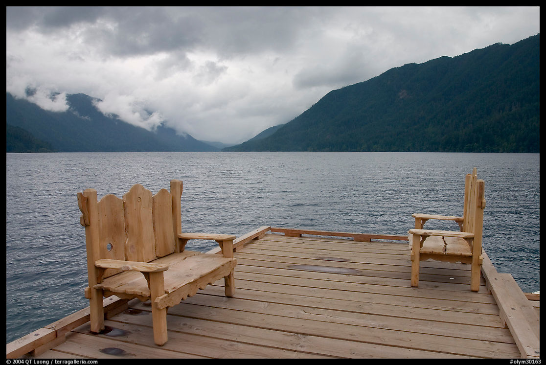 Two chairs on pier, Crescent Lake. Olympic National Park, Washington, USA.