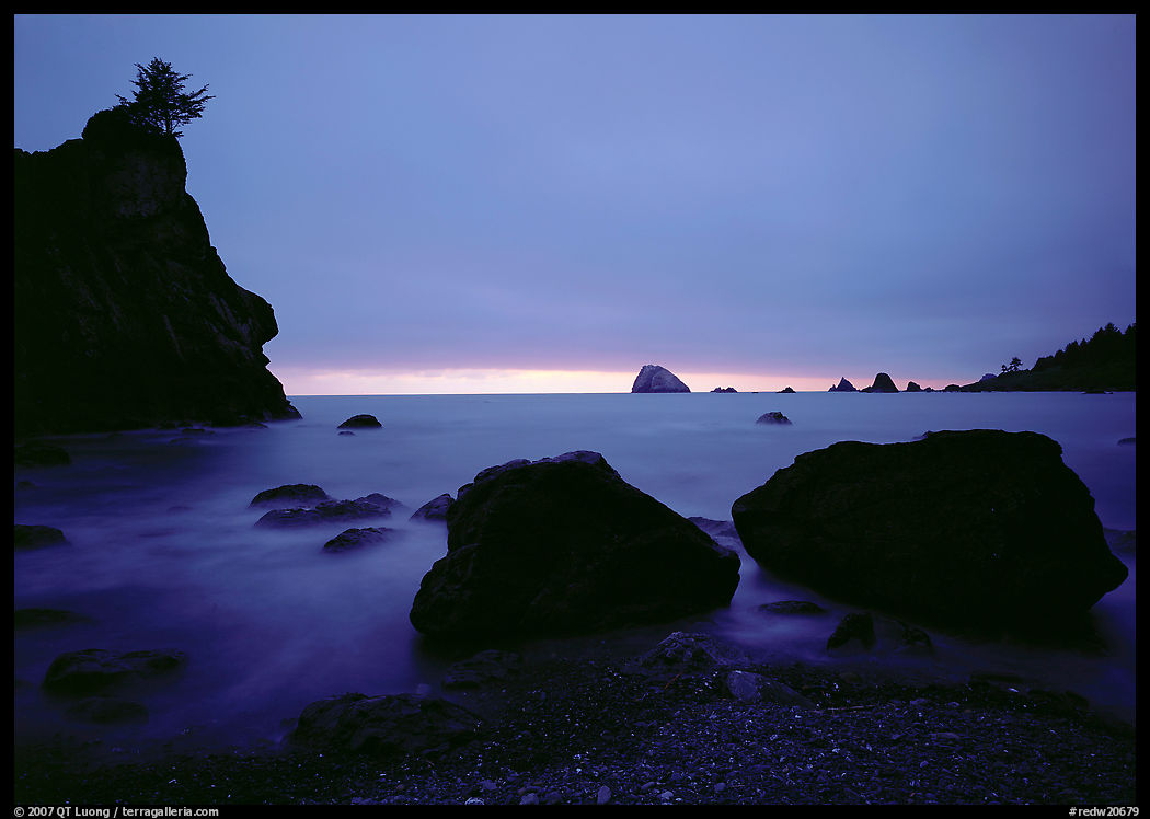 Rocks and seastacks, cloudy sunset. Redwood National Park, California, USA.