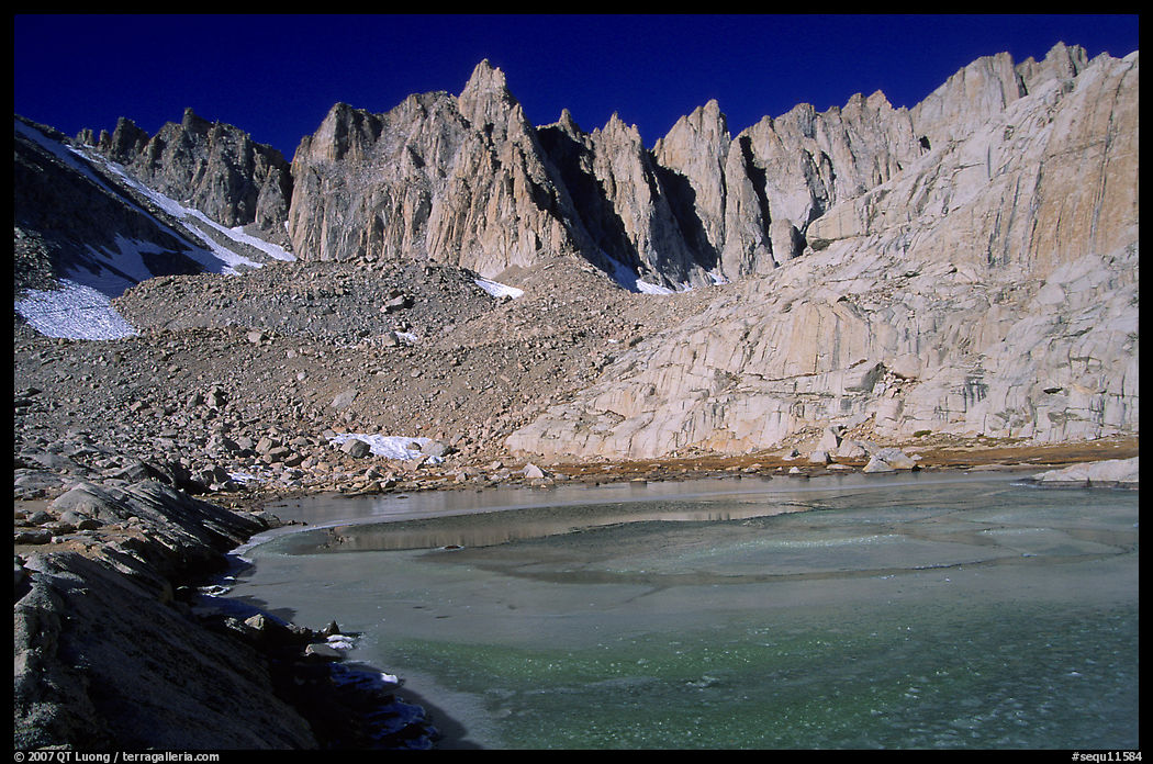 Frozen lake near Trail Camp and Mt Whitney chain. Sequoia National Park, California, USA.