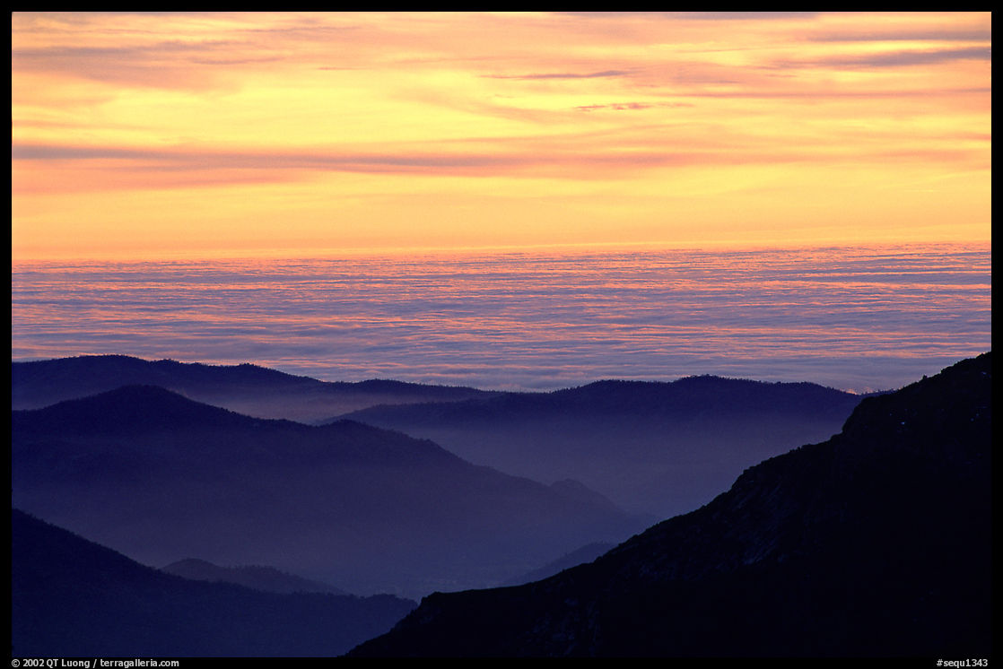 Receding lines of  foothills and sea of clouds at sunset. Sequoia National Park, California, USA.