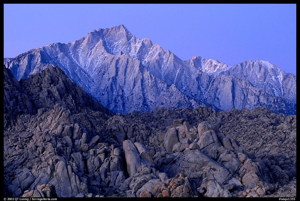 Volcanic boulders in Alabama hills and Lone Pine Peak, dawn. Sequoia National Park, California, USA.