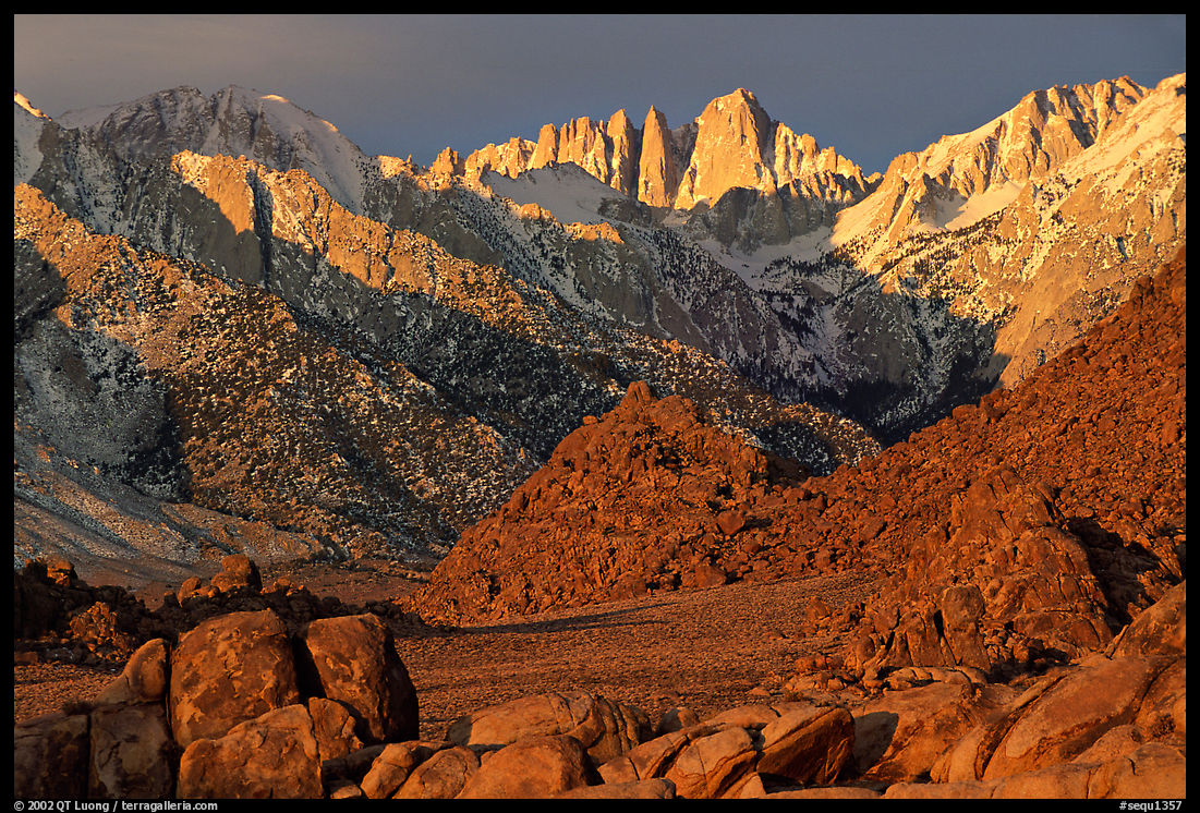 Volcanic boulders in Alabama hills and Mt Whitney, sunrise. Sequoia National Park, California, USA.