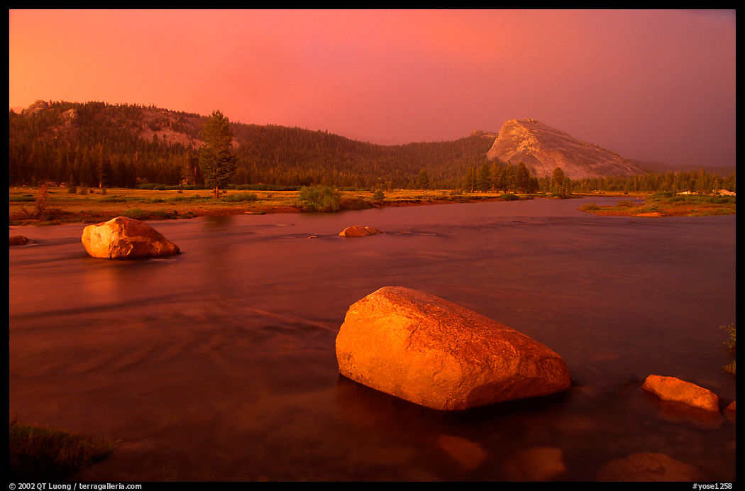Tuolumne Meadows, Lembert Dome, and rainbow, storm clearing at sunset. Yosemite National Park, California, USA.