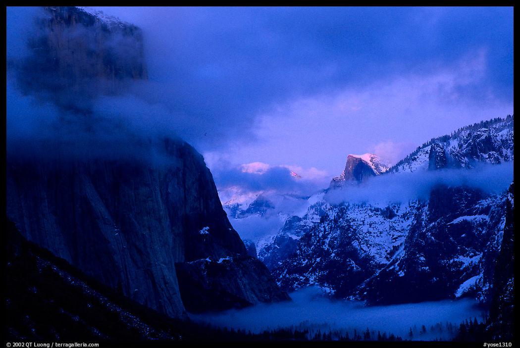 Valley view with fog, winter sunset. Yosemite National Park, California, USA.