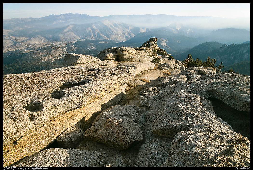 Summit of Mount Hoffman with hazy Yosemite Valley in the distance. Yosemite National Park, California, USA.