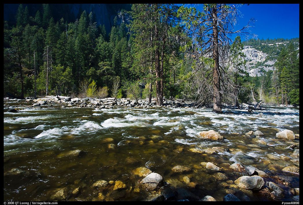 Wide stretch of Merced River in spring, Lower Merced Canyon. Yosemite National Park