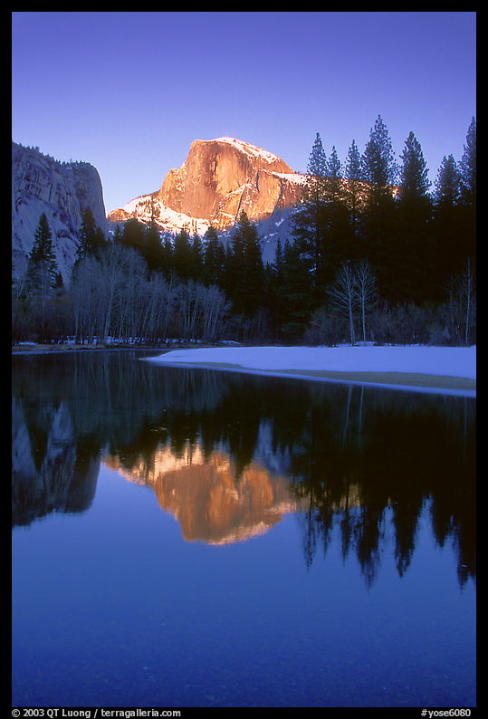 Half-Dome reflected in Merced River, winter sunset. Yosemite National Park, California, USA.