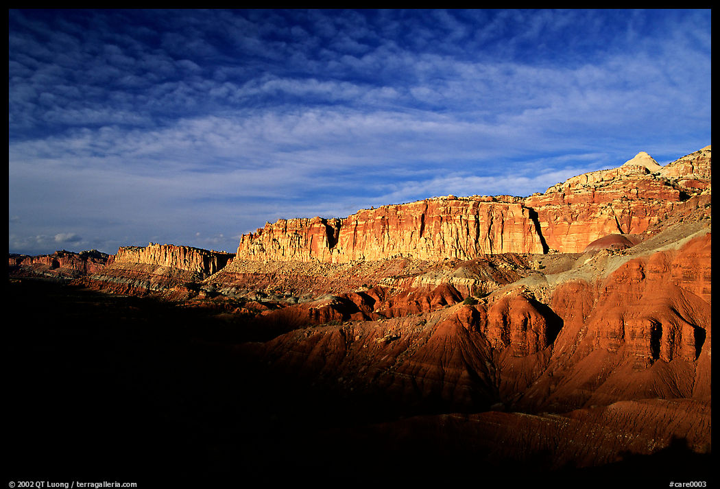 Layers of rock on  West face of Waterpocket Fold at sunset. Capitol Reef National Park, Utah, USA.