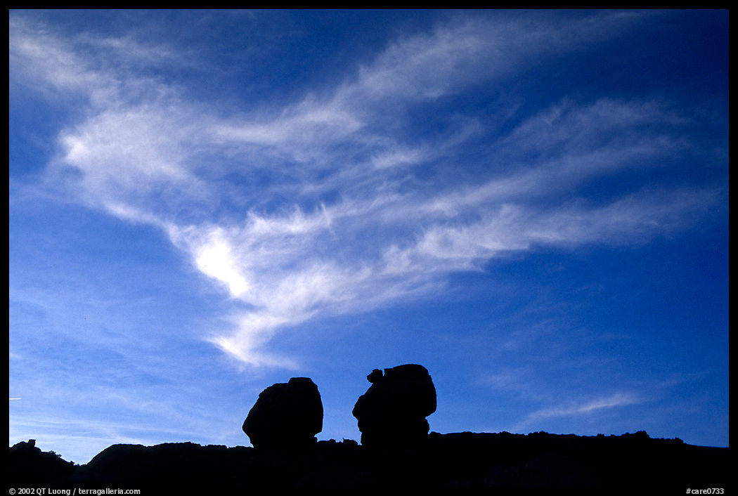 Twin boulders and clouds, dusk. Capitol Reef National Park