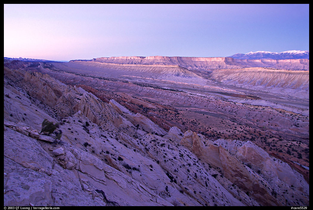 Tilted rock layers, Waterpocket Fold, sunset. Capitol Reef National Park