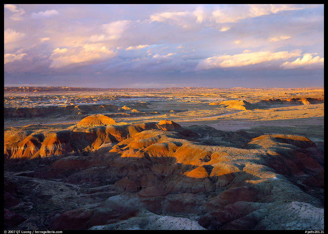 Painted desert seen from Chinde Point, stormy sunset. Petrified Forest National Park, Arizona, USA.