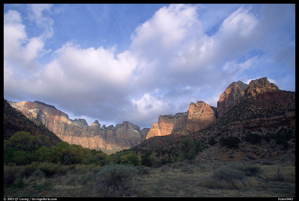 Wide view of Towers of the Virgin and clouds at sunrise. Zion National Park