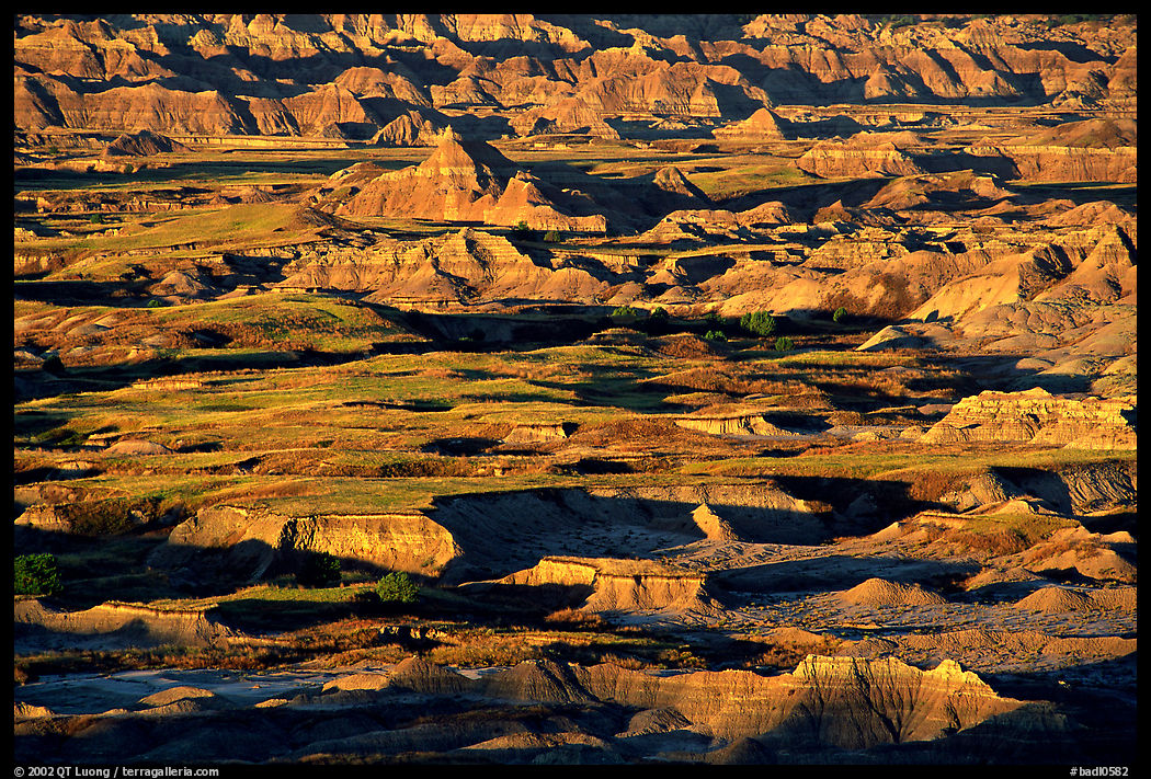 Badland ridges and prairie from above, sunrise. Badlands National Park, South Dakota, USA.