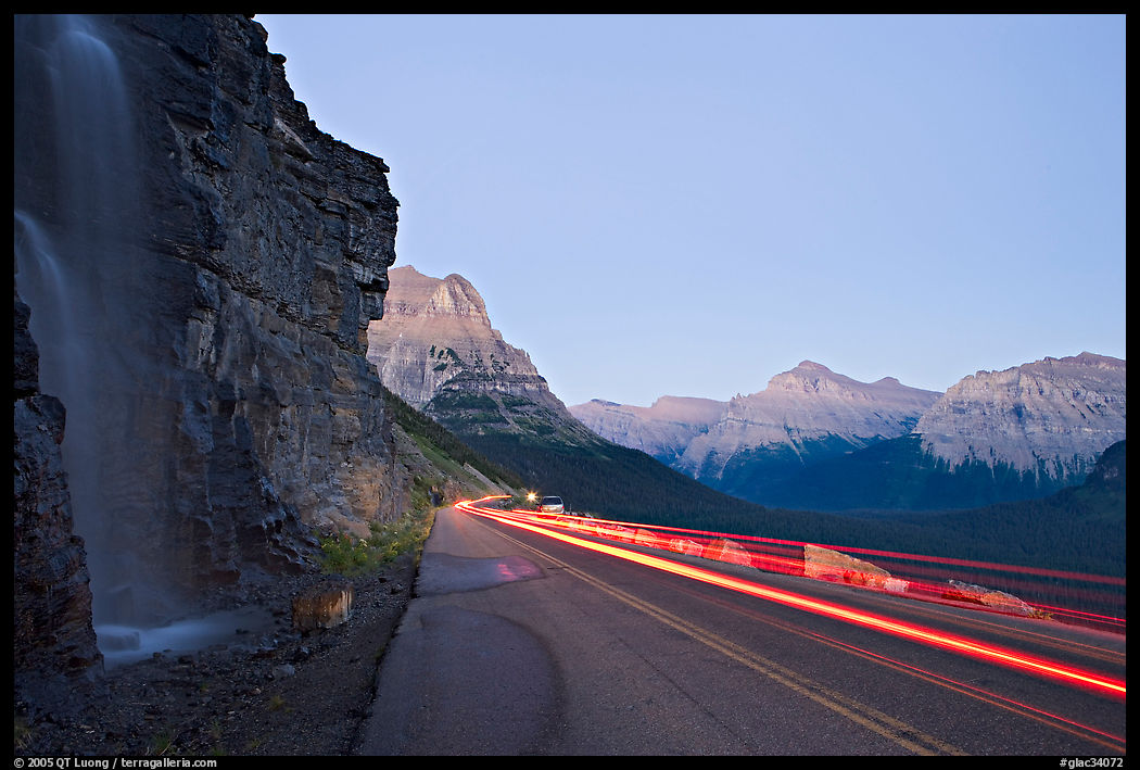 Roadside waterfall and light trail, Going-to-the-Sun road. Glacier National Park, Montana, USA.