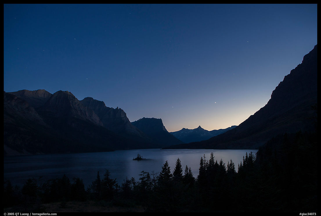 St Mary Lake at night with stars. Glacier National Park
