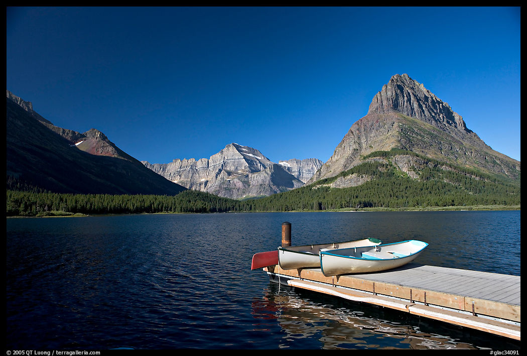 Deck and small boats on Swiftcurrent Lake. Glacier National Park, Montana, USA.