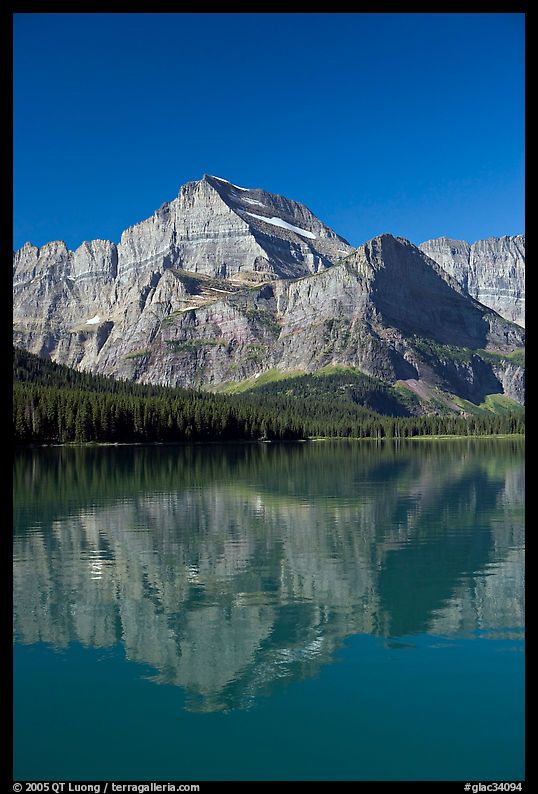 Mt Gould reflected in Lake Josephine, morning. Glacier National Park