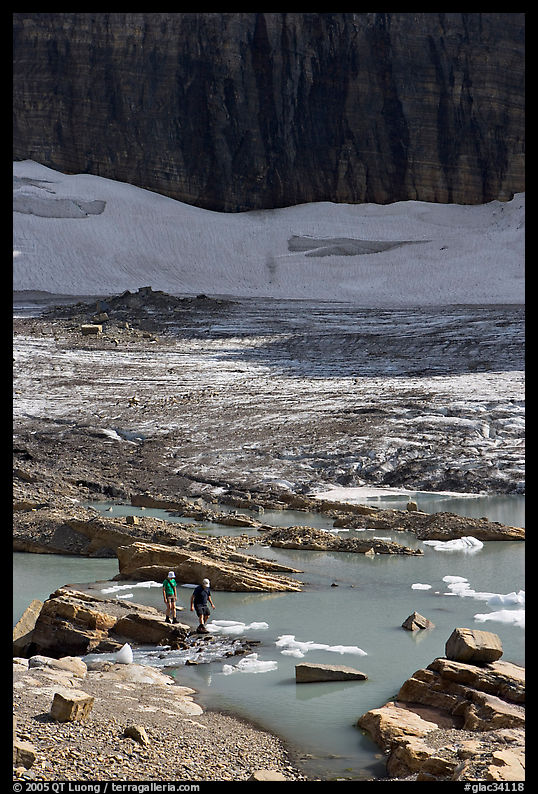 Crossing the outlet stream of the Grinnell glacial lake. Glacier National Park, Montana, USA.