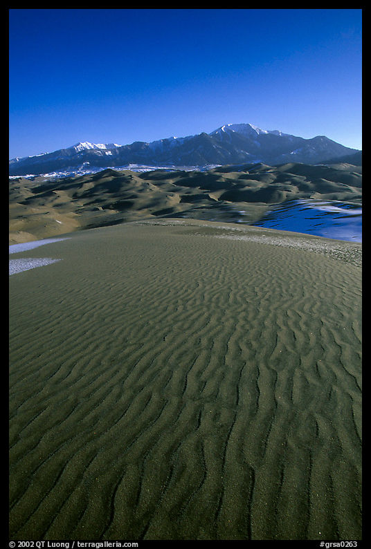 Sand ripples and Sangre de Christo mountains in winter. Great Sand Dunes National Park, Colorado, USA.