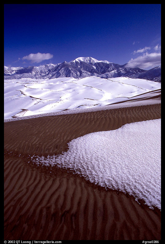 Sand dunes with snow patches. Great Sand Dunes National Park, Colorado, USA.