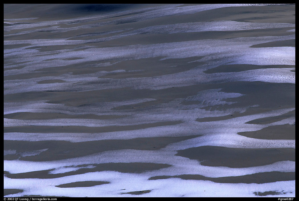 Pattern of snow over dunes. Great Sand Dunes National Park, Colorado, USA.