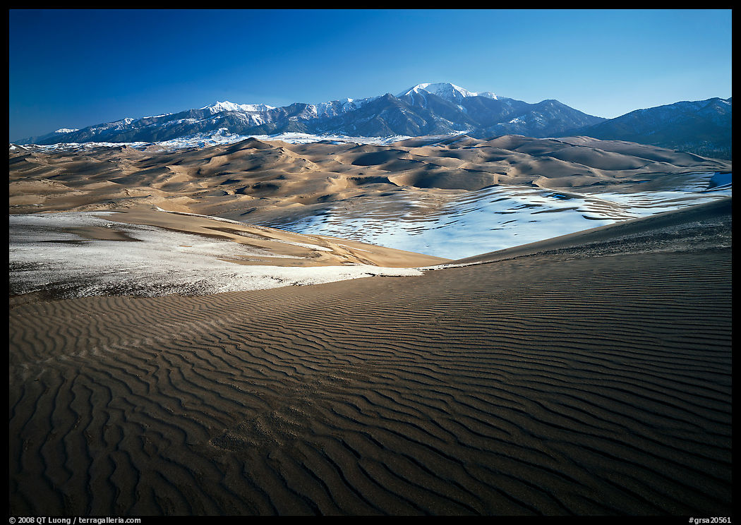 Rippled dunes and Sangre de Christo mountains in winter. Great Sand Dunes National Park, Colorado, USA.