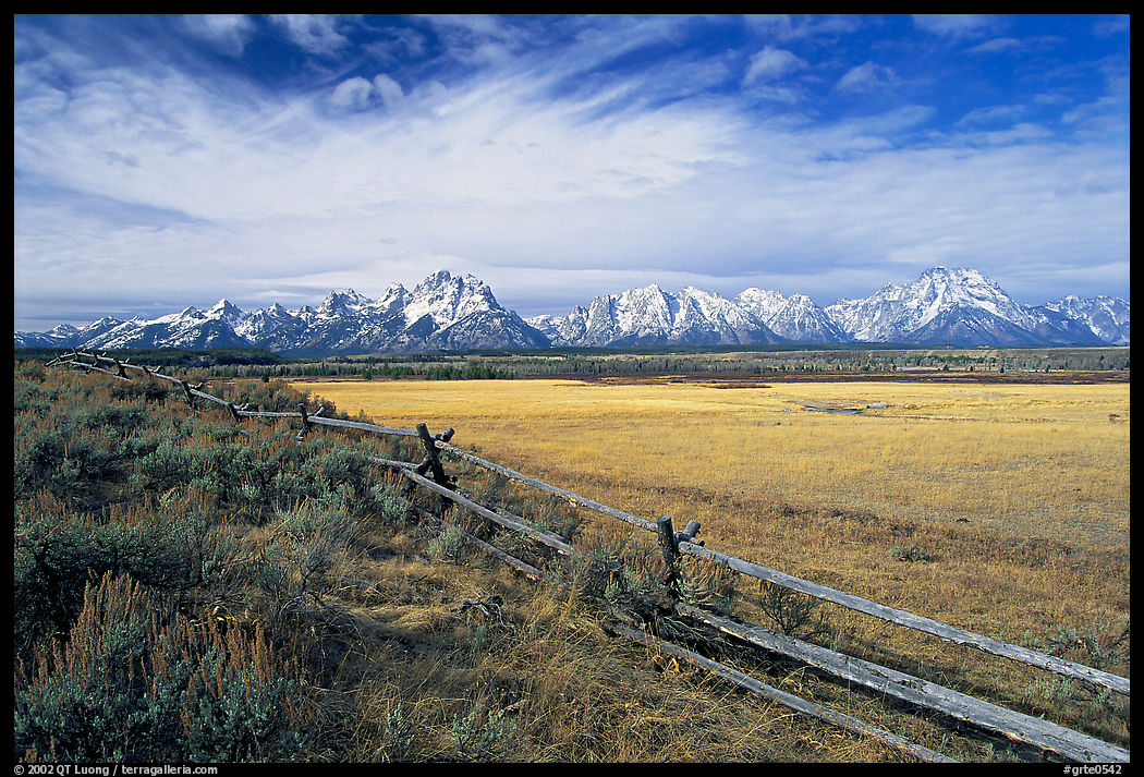 Fence and Teton range in fall. Grand Teton National Park, Wyoming, USA.